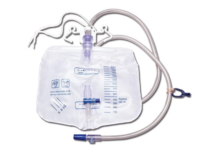 Heat sealing machine for drainage bags